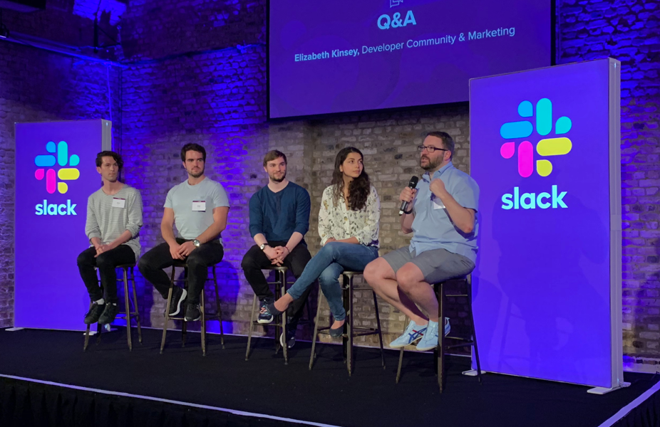 Image of people talking at a Slack Platform event